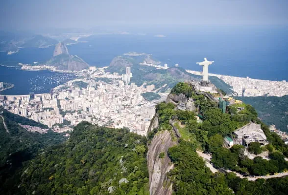 Aerial view of Rio de Janeiro with Christ the Redeemer, representing easy financial connections to Brazil.