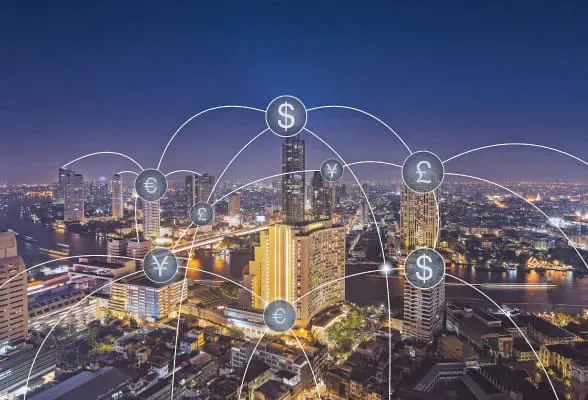 Night cityscape with currency symbols, illustrating global payment networks and local currency acceptance.