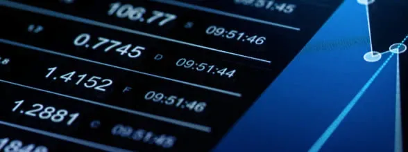 Close-up of financial data screen, illustrating cross-border payments for financial institutions.