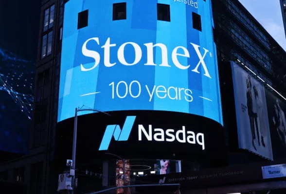 StoneX 100 years anniversary displayed on Nasdaq building, symbolizing its global presence and stability.